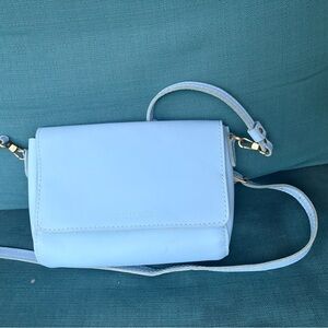 Portland leather metro crossbody in glacial blue